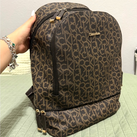 Calvin Klein Handbags - Calvin Klein Monogram Backpack